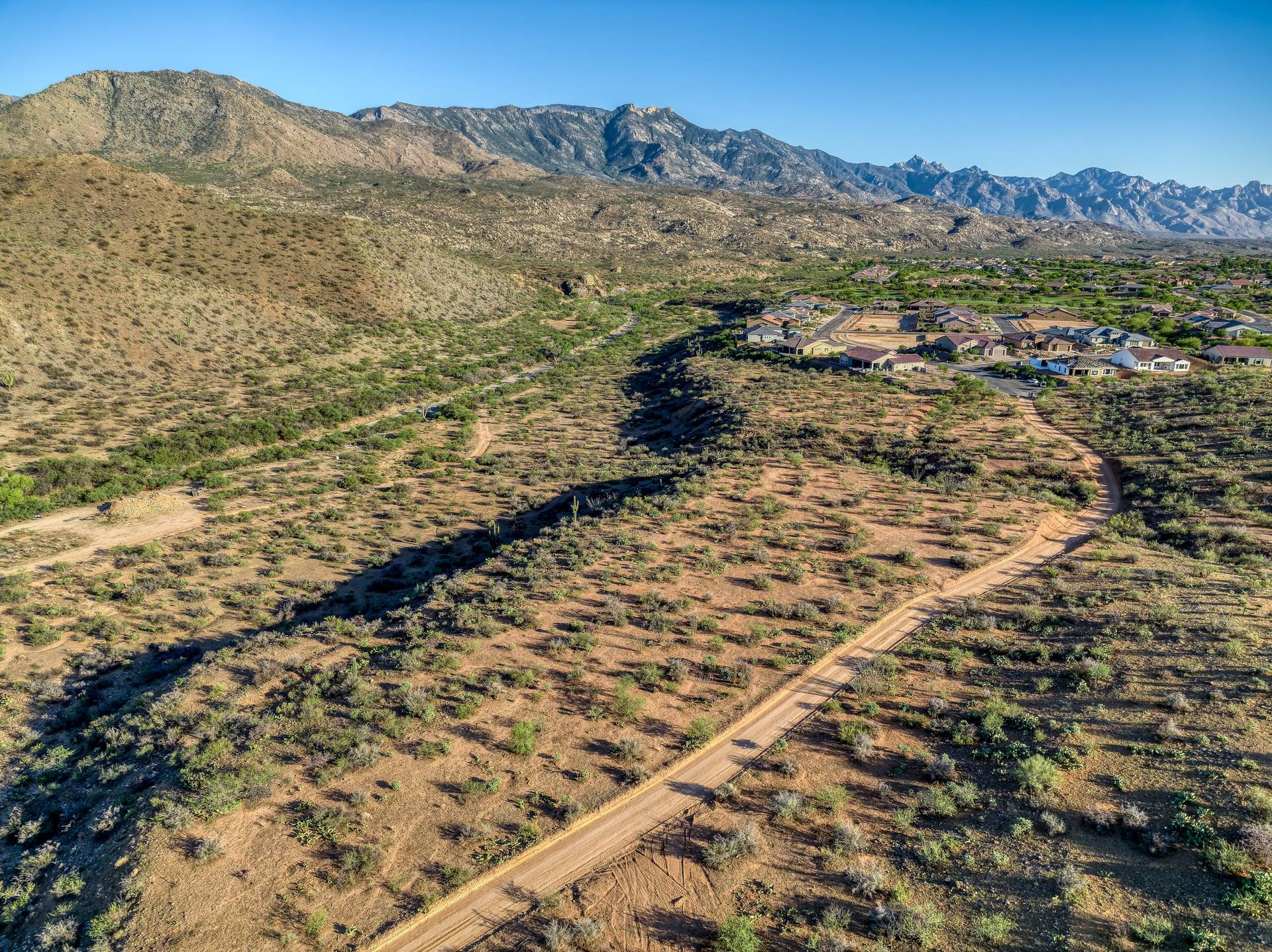 Aerial view of the ELEMENT by SENERGY360 land with the Santa Catalina Mountains behind