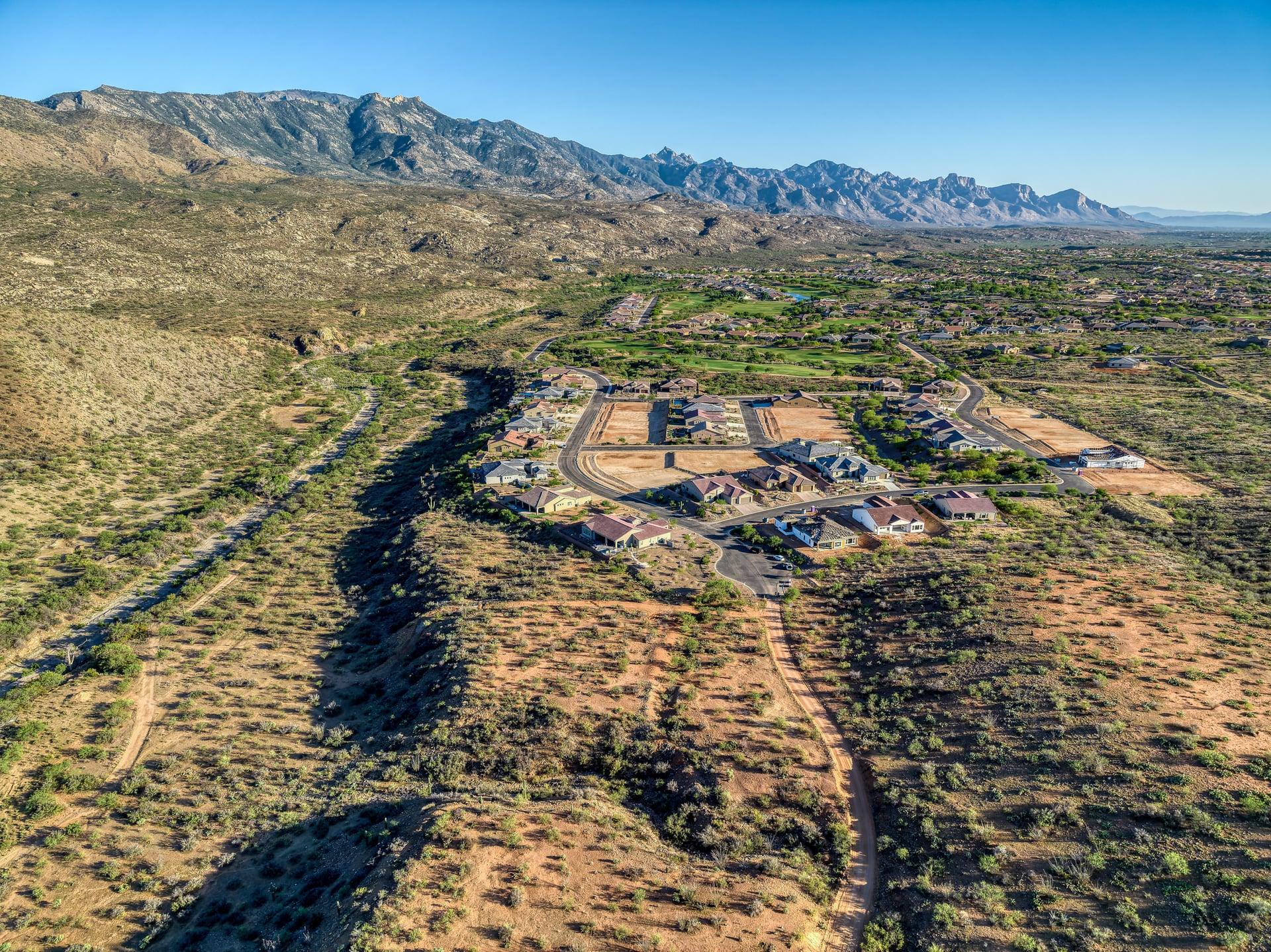 Aerial view over the neighboring community toward the Catalinas