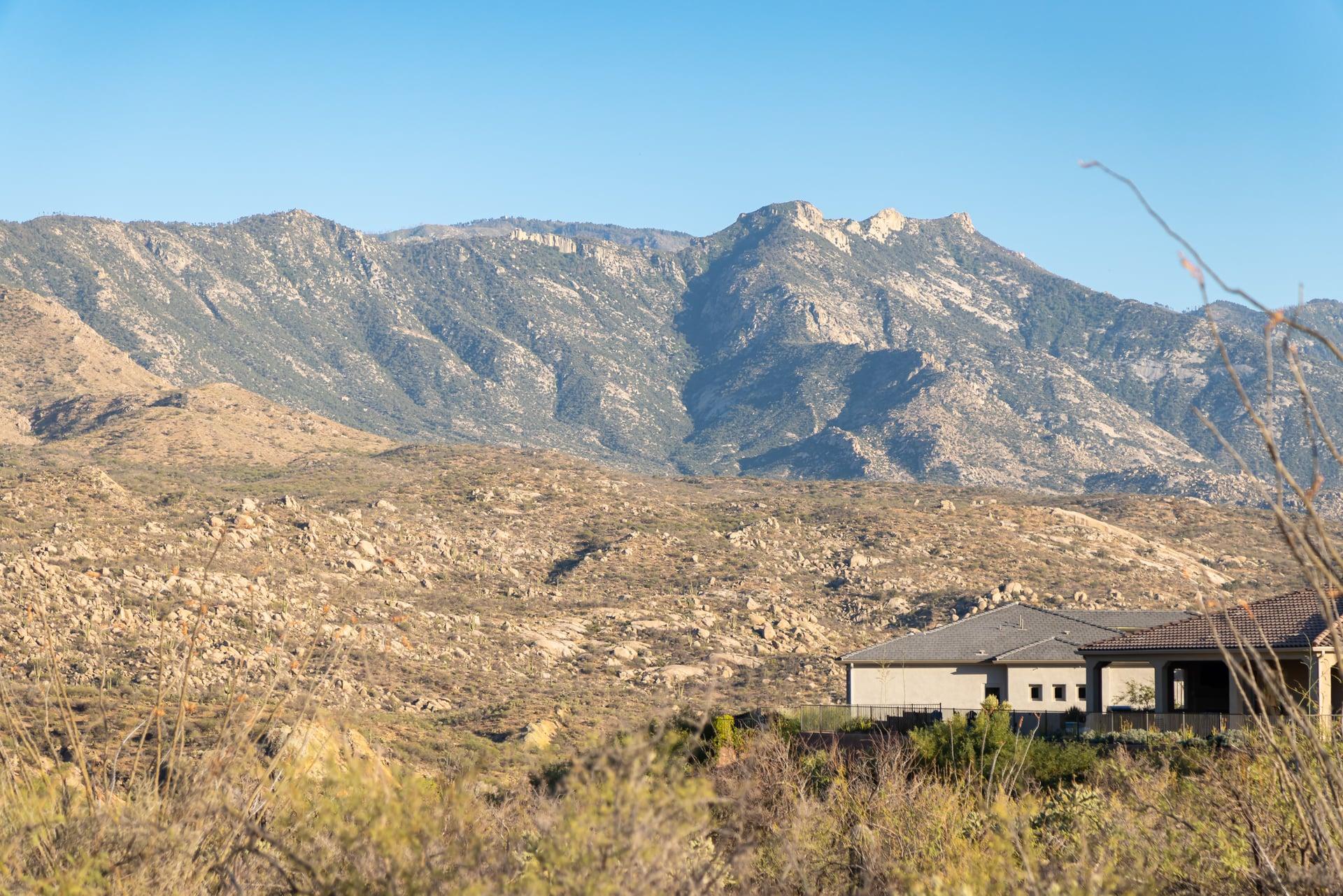 Home nestled into the foothills below the Catalina peaks