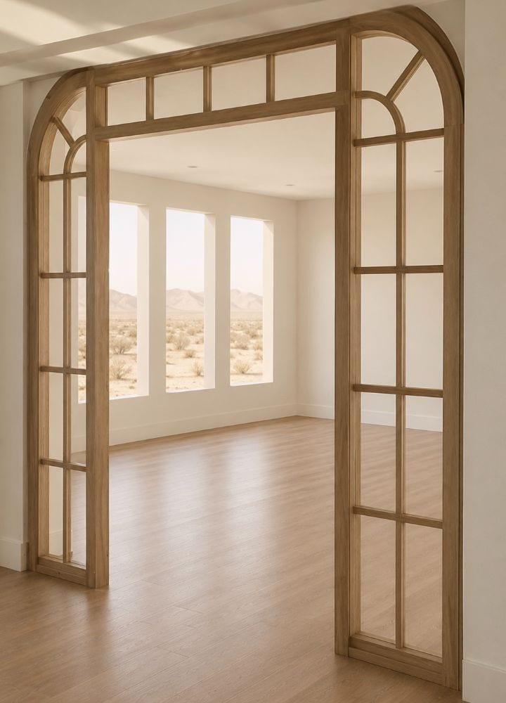 Arched glass partitions framing the desert light