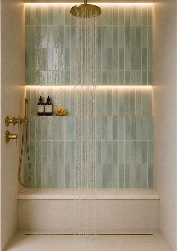 Walk-in spa shower with bench and illuminated niches