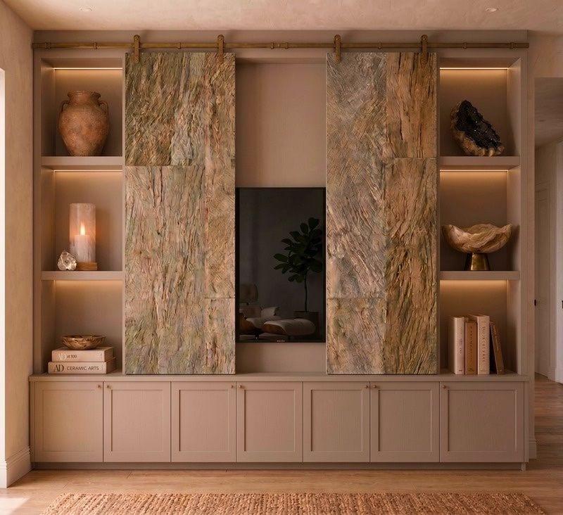 Built-in media cabinetry with book-matched stone panels