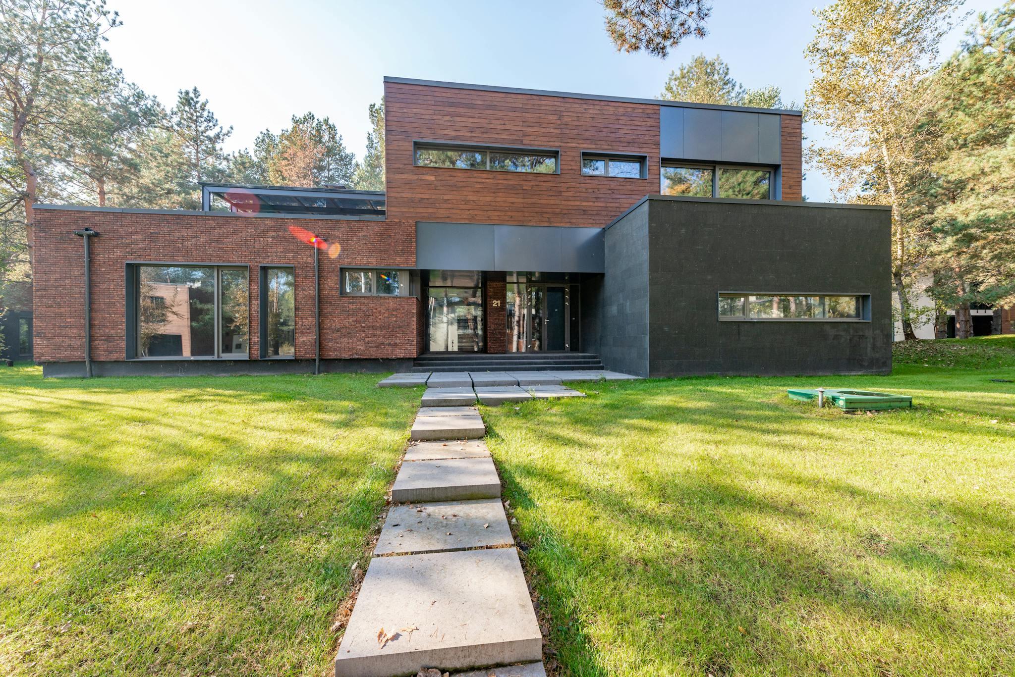 contemporary building with brick and glass facade