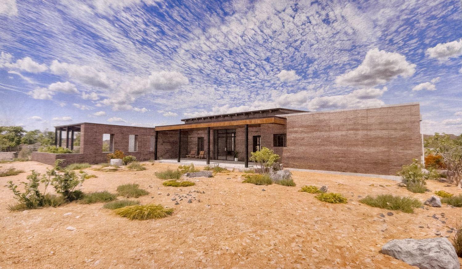 Wide rendering of the finished residence sited in the open desert