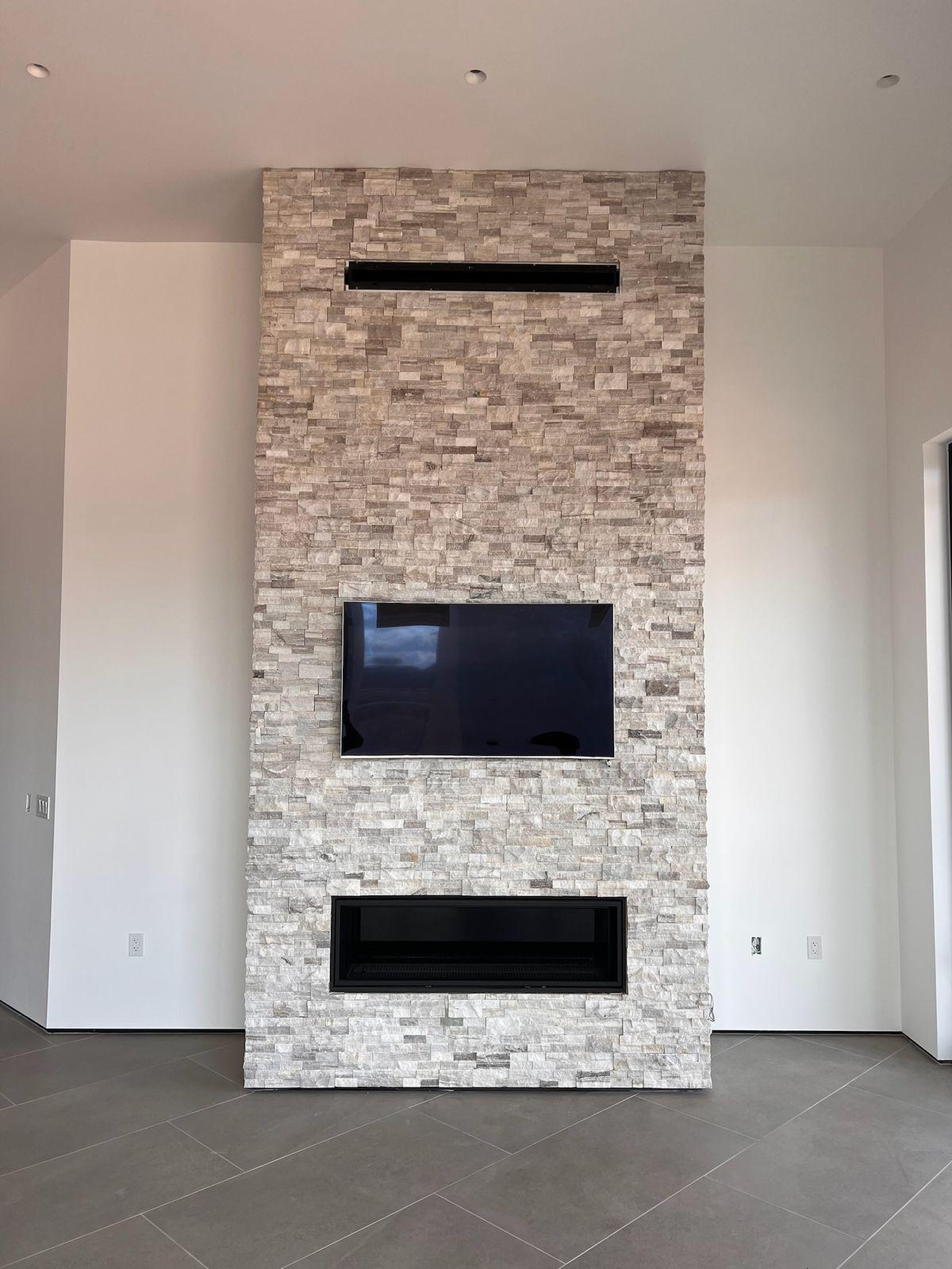 Stacked-stone fireplace wall