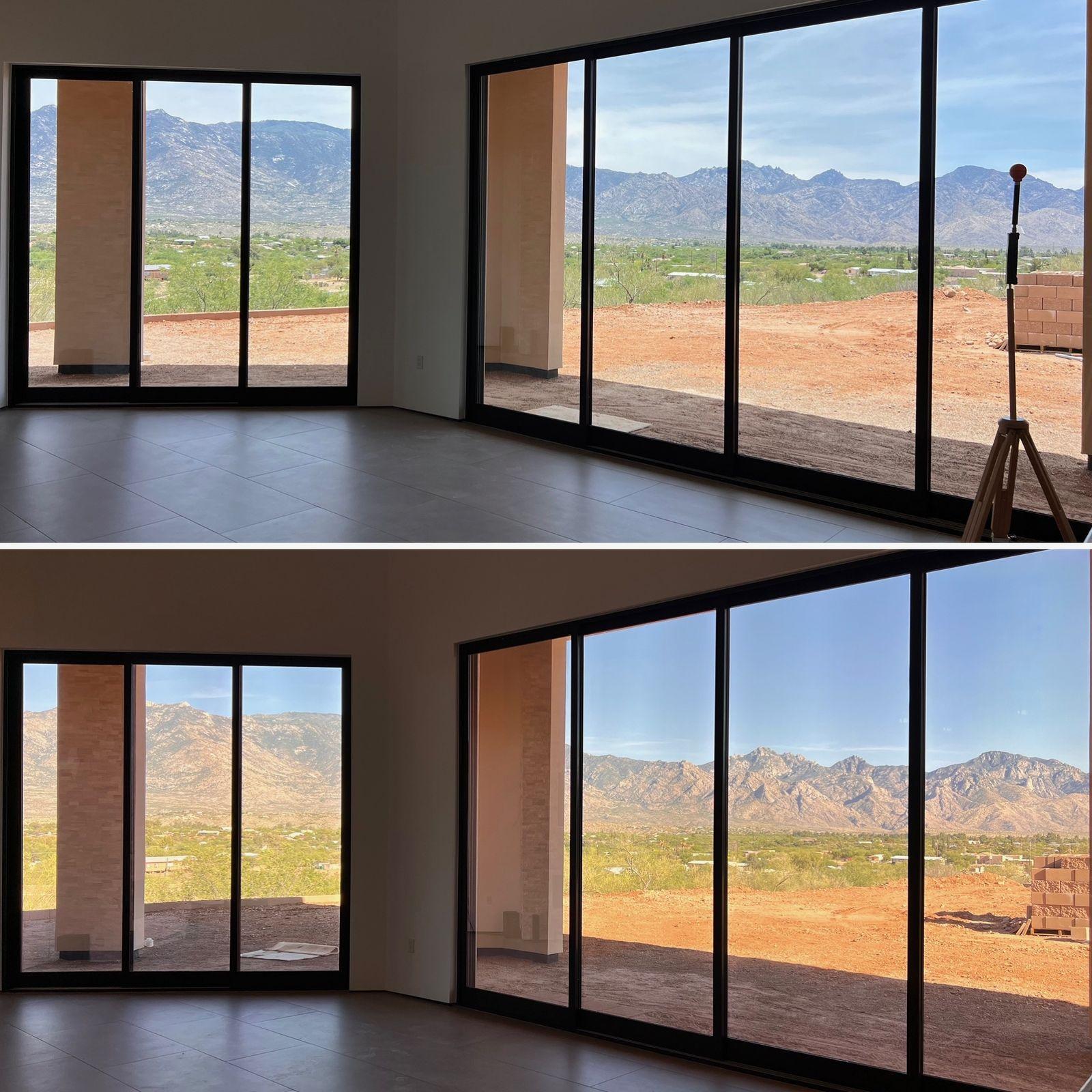 Floor-to-ceiling glass facing the mountains