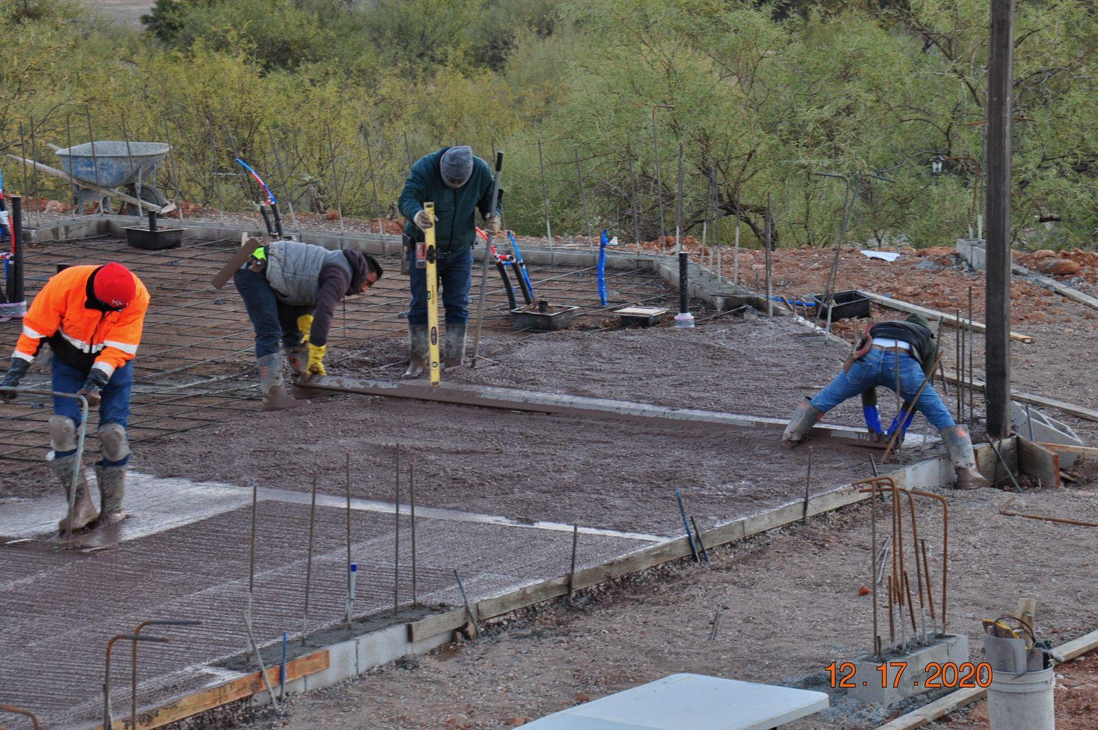 Crew working the slab pour