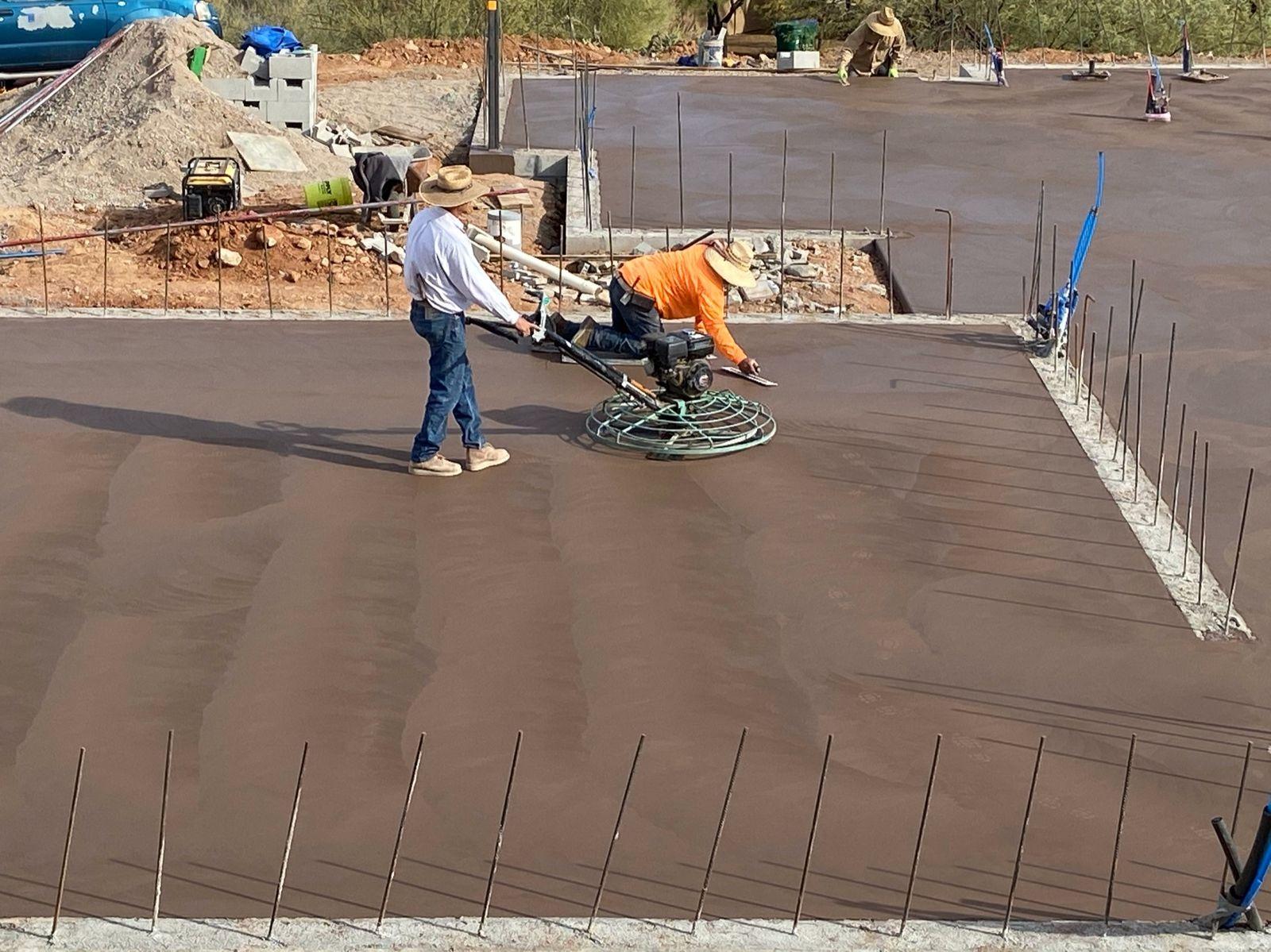 Power troweling the slab