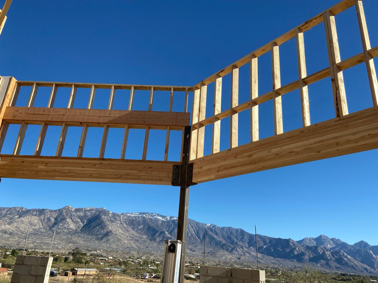 Roof framing with the mountains through the openings
