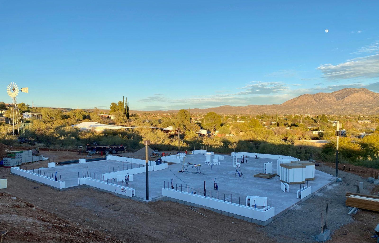 First courses of white ICF blocks on the slab