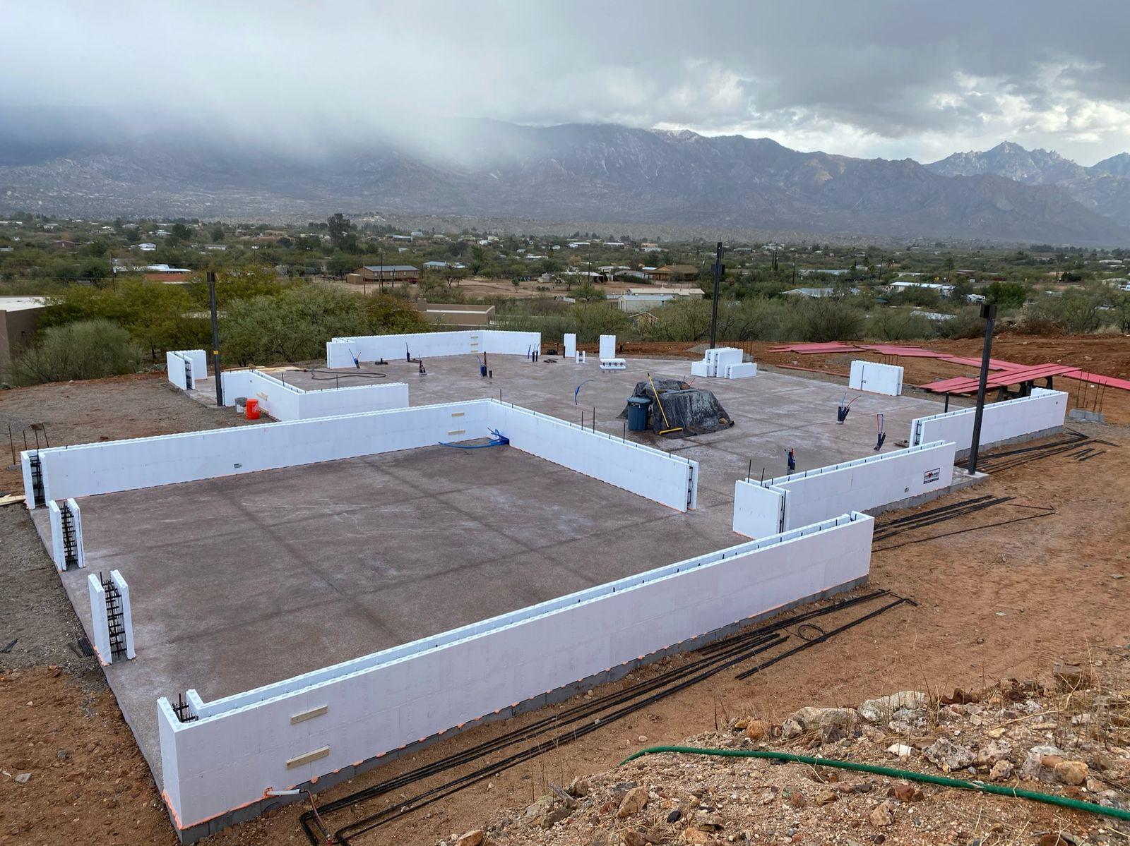 ICF walls rising around the slab