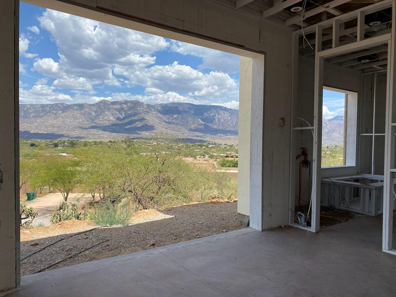 Large window opening framing the desert