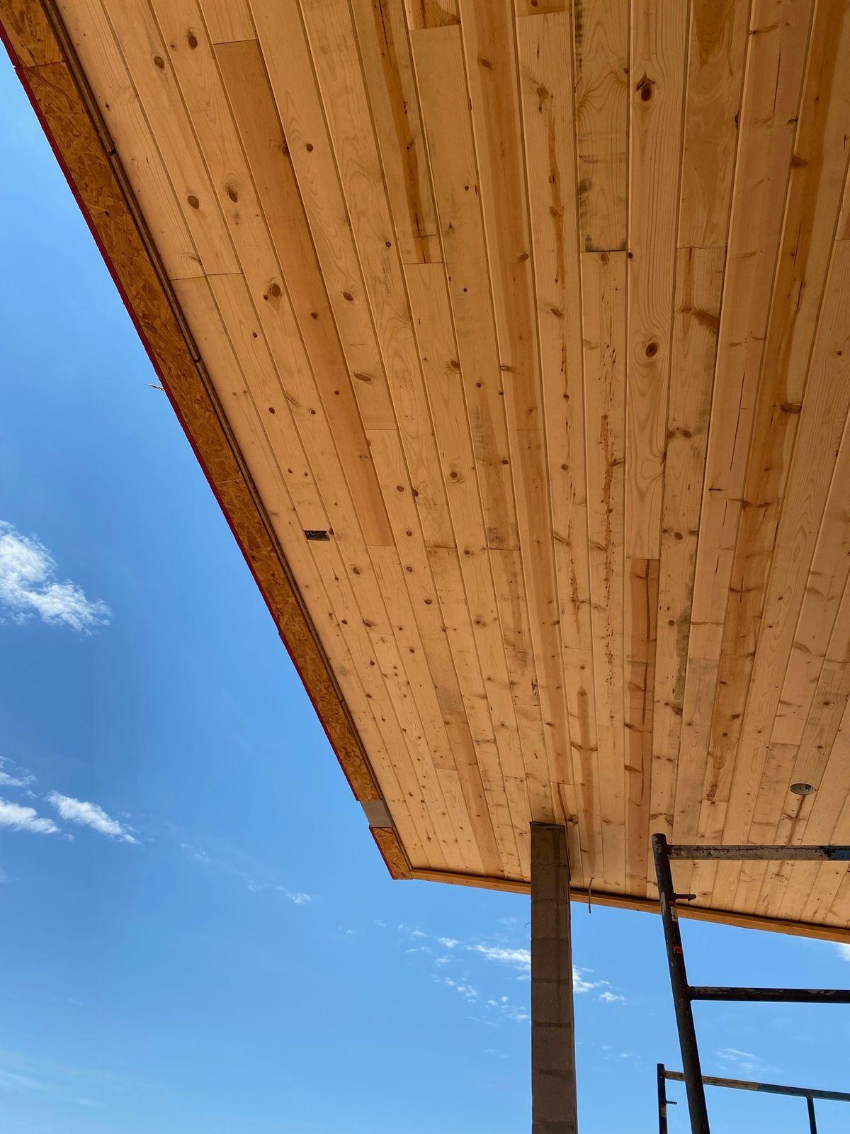 Wood soffit under the roof overhang
