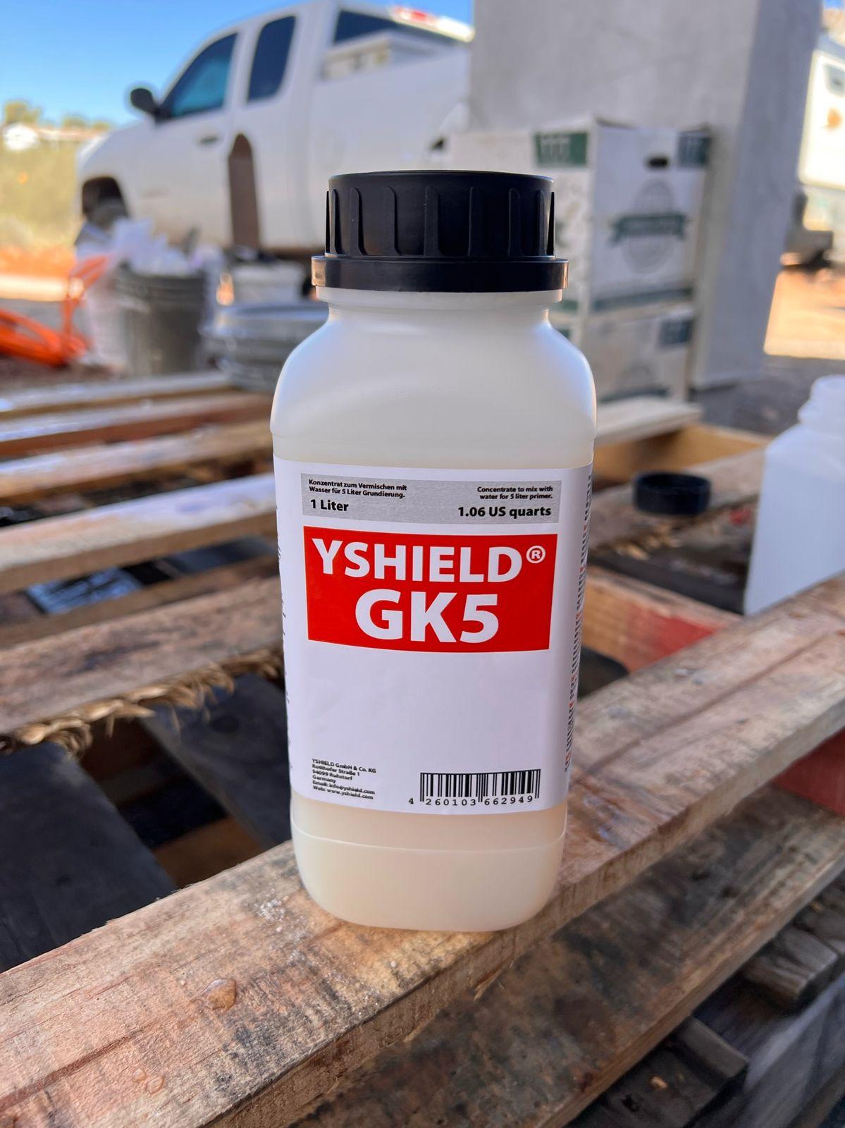Bottle of YSHIELD GK5 shielding paint on the job site