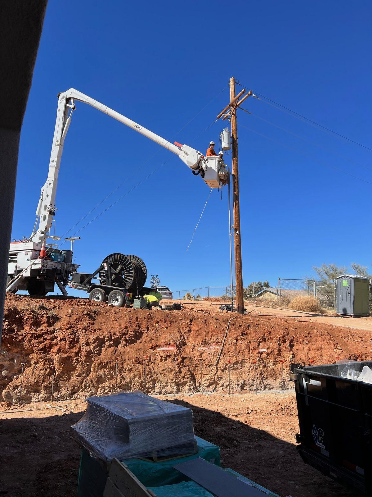 Utility work at the service pole