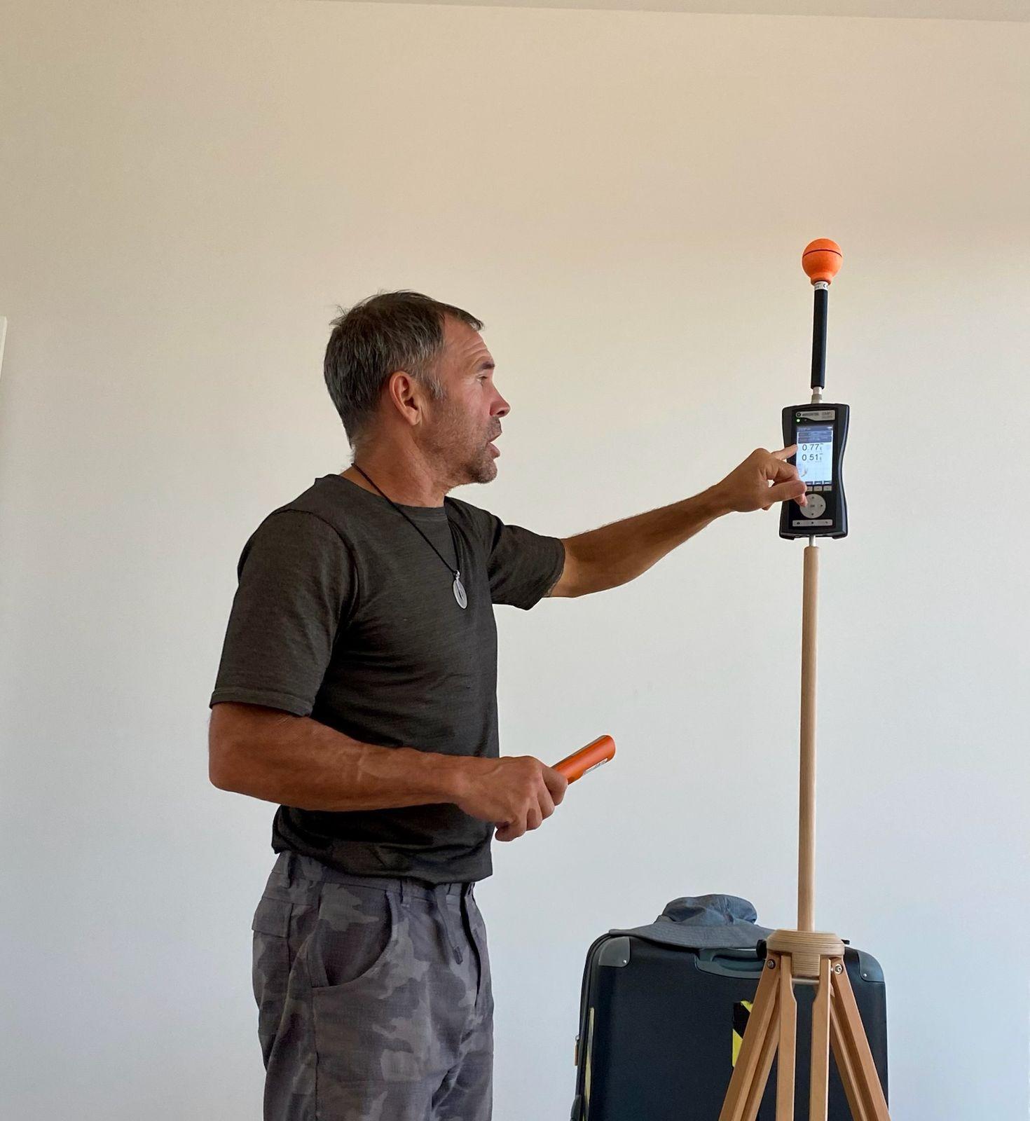 Brian Johnson testing with a meter on a tripod