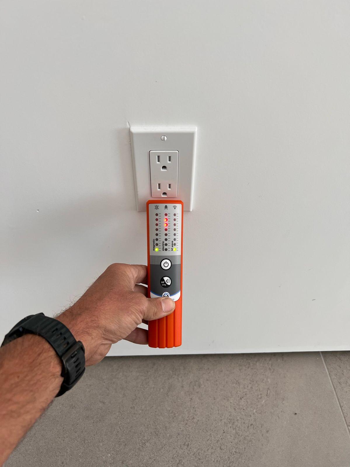 Checking an outlet with an electric field meter