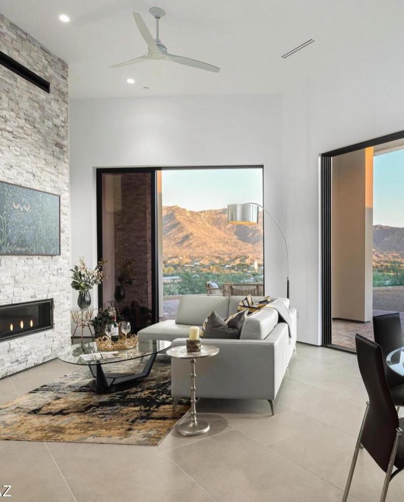 Living area with fireplace and sliding glass doors framing the Catalina foothills