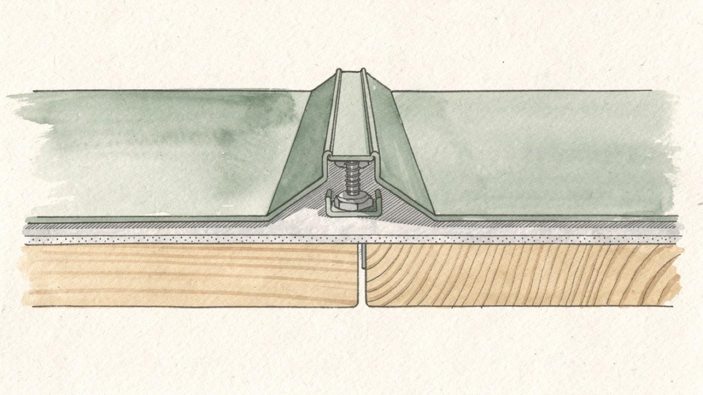 Cutaway of a standing seam roof panel edge showing the raised interlocked seam, a concealed clip and fastener, breathable underlayment and the roof deck beneath